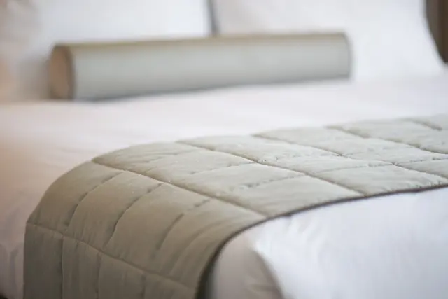 close-up-gray-blanket-bed.jpg
