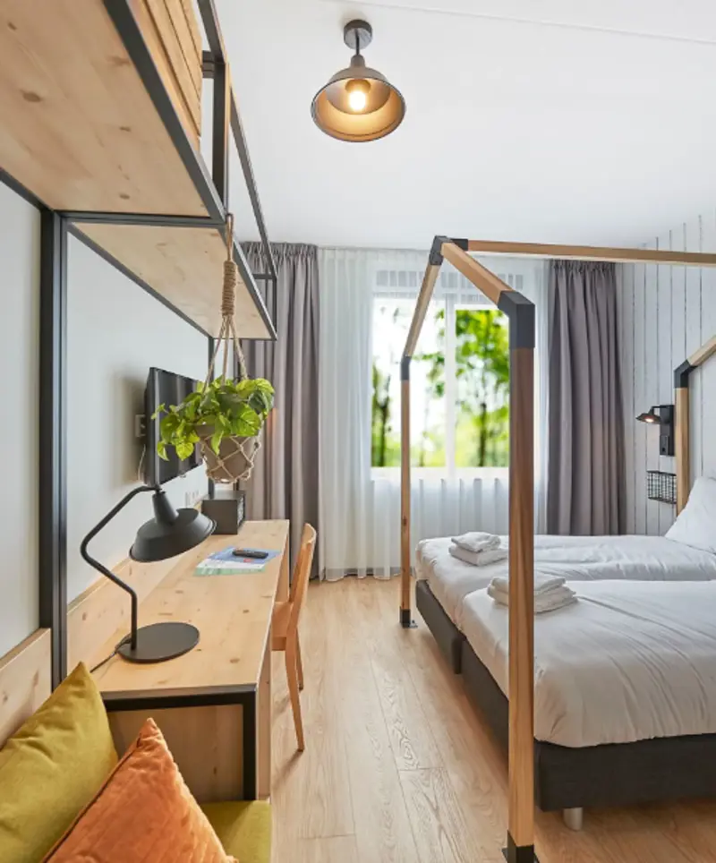 Guesthouse hotel kamers.png